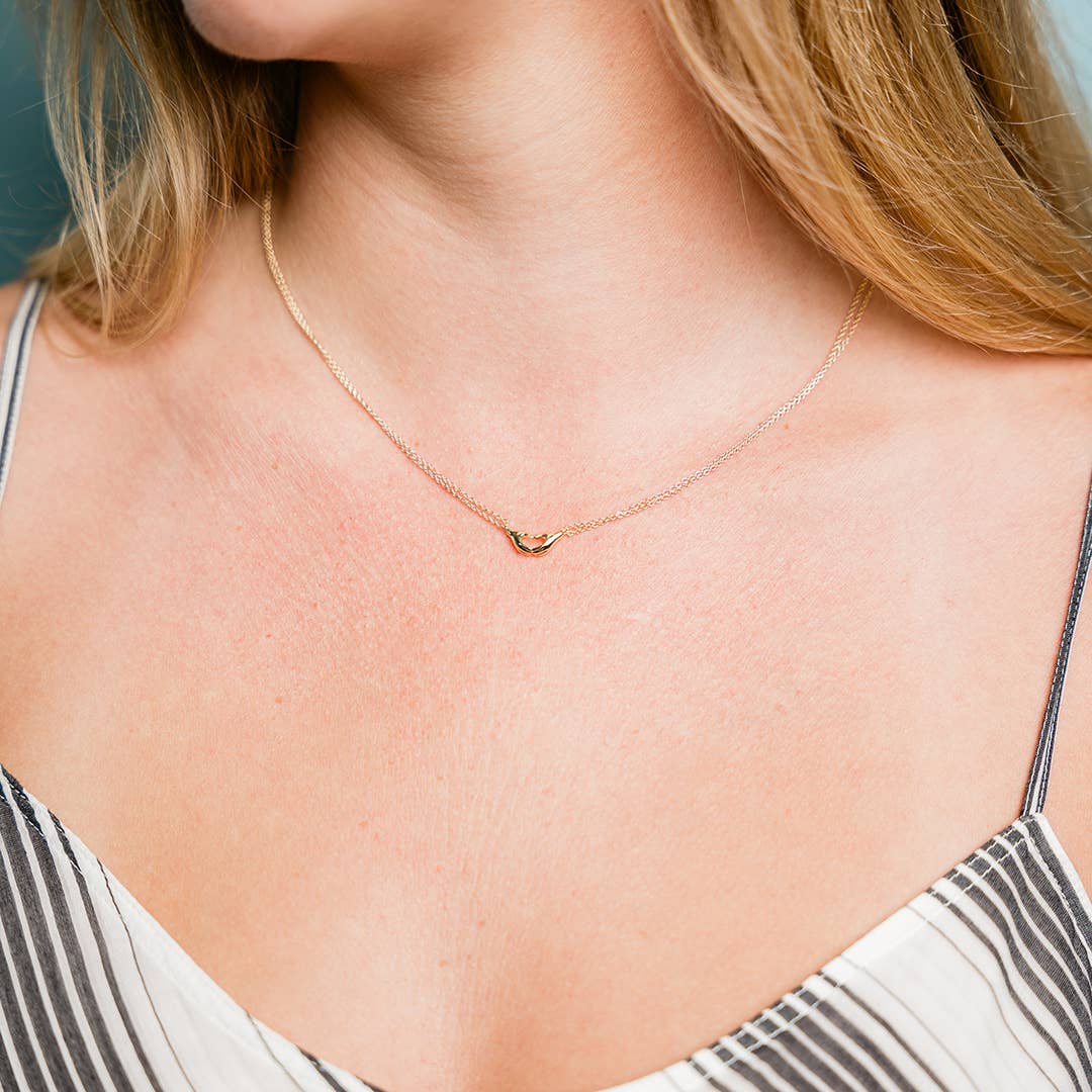 Ornamental Things - Hand Heart Necklace
