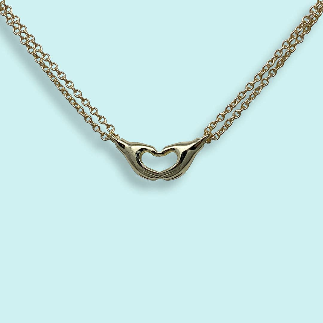 Ornamental Things - Hand Heart Necklace