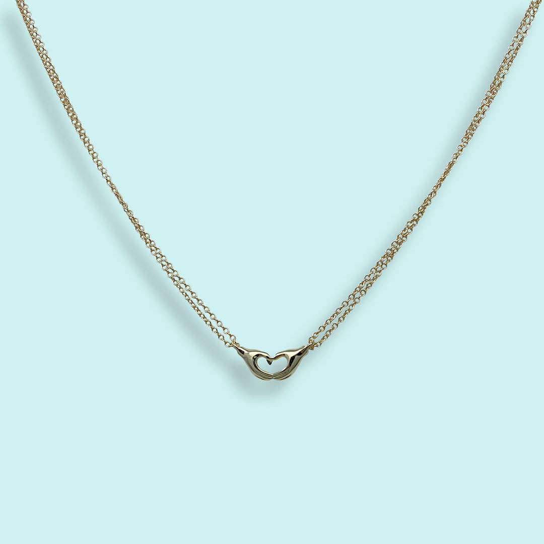 Ornamental Things - Hand Heart Necklace