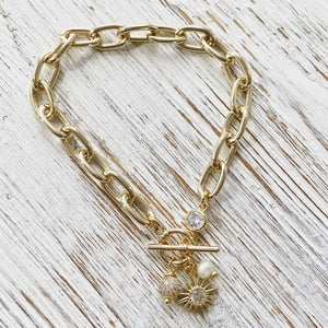 Chunky gold chain bracelet, sun, pearl