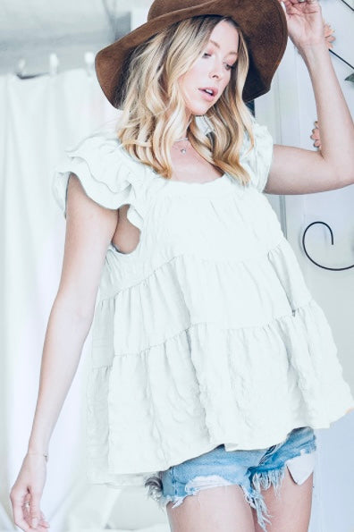 Bucketlist Tiered Solid Textured Babydoll Top